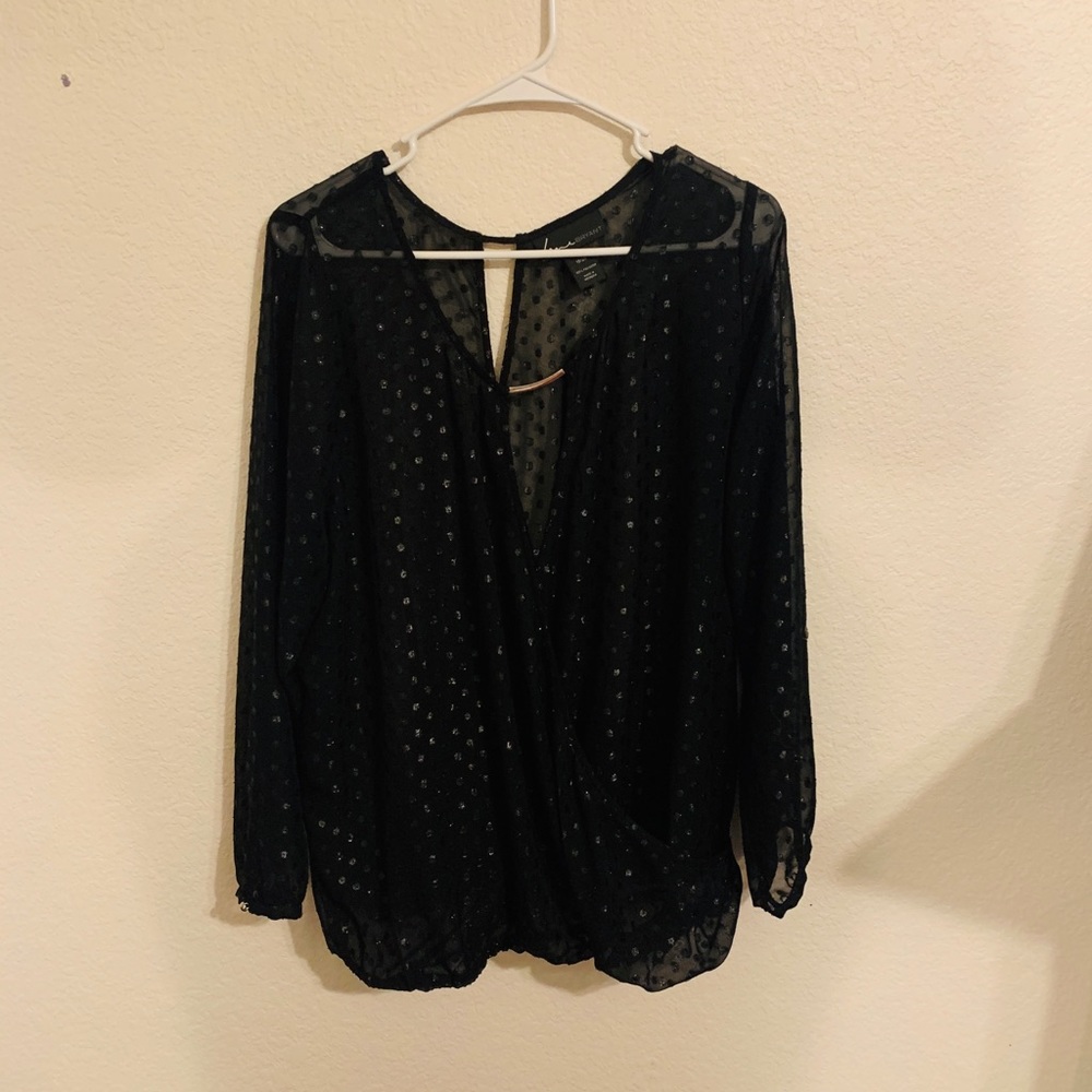 Black, pokeadots over shirt.